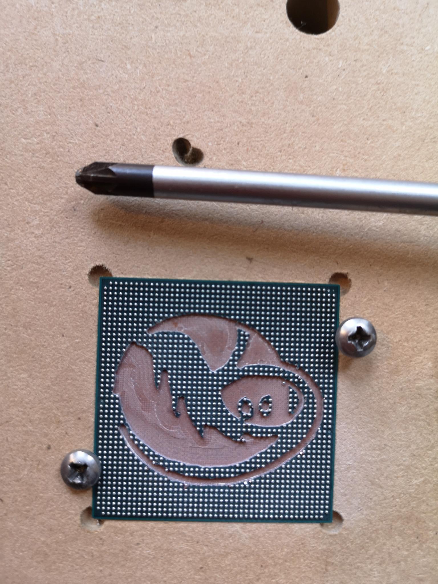 At-memory chip with milled logo